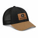 A black and tan John Deere hat with a reflective tactical patch on the front and a plastic snap closure.