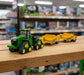 John Deere 1:64 9RX 590 with 1812DC Scraper
