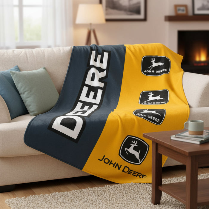 John Deere C&F Build Blanket lying on a couch