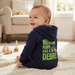 a baby is wearing the John Deere Infant Boys "Nothing Runs Like A Deere" Zip Hoodie with toys in the background
