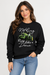 A woman wearing a black John Deere Ladies "Nothing Runs Like a Deere" Crew Fleece  with a green tractor graphic and the text 'Nothing Runs like a Deere' in white script, paired with blue jeans, against a light gray studio background.