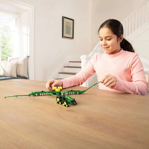 playing with the John Deere 1:64 8RX 410 Tractor with Planter