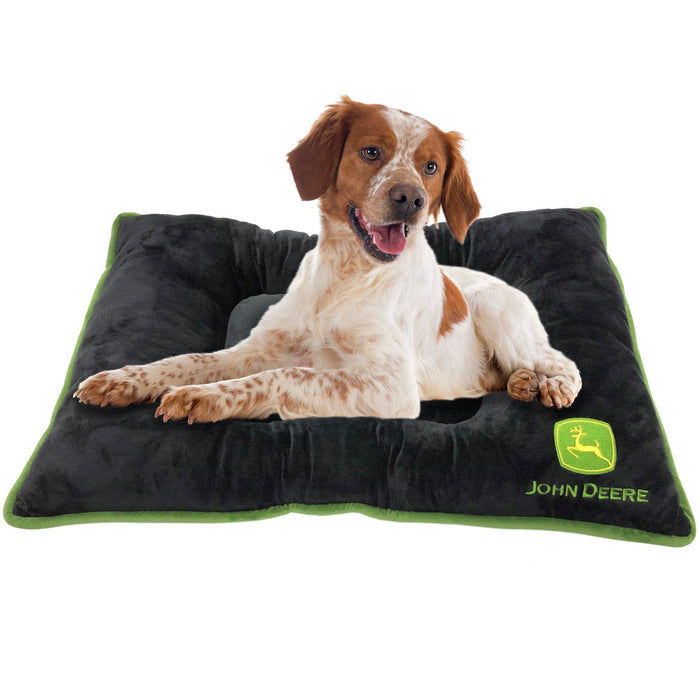 dog sitting on the John Deere Pet Bed